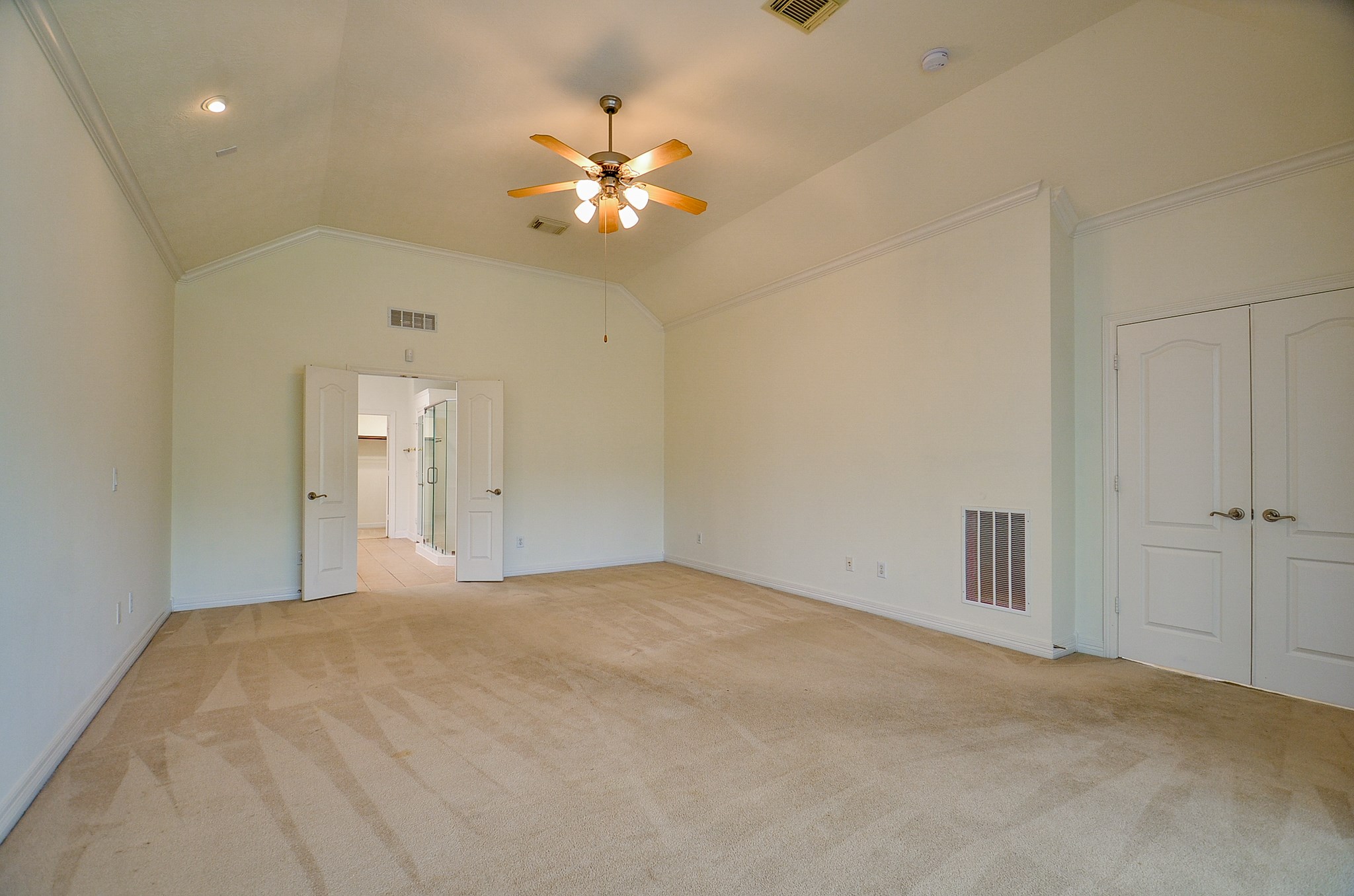 12522 Aliso Bend Lane Houston, TX 77041 - Photo 14 of 32 a view of an empty room with a chandelier fan