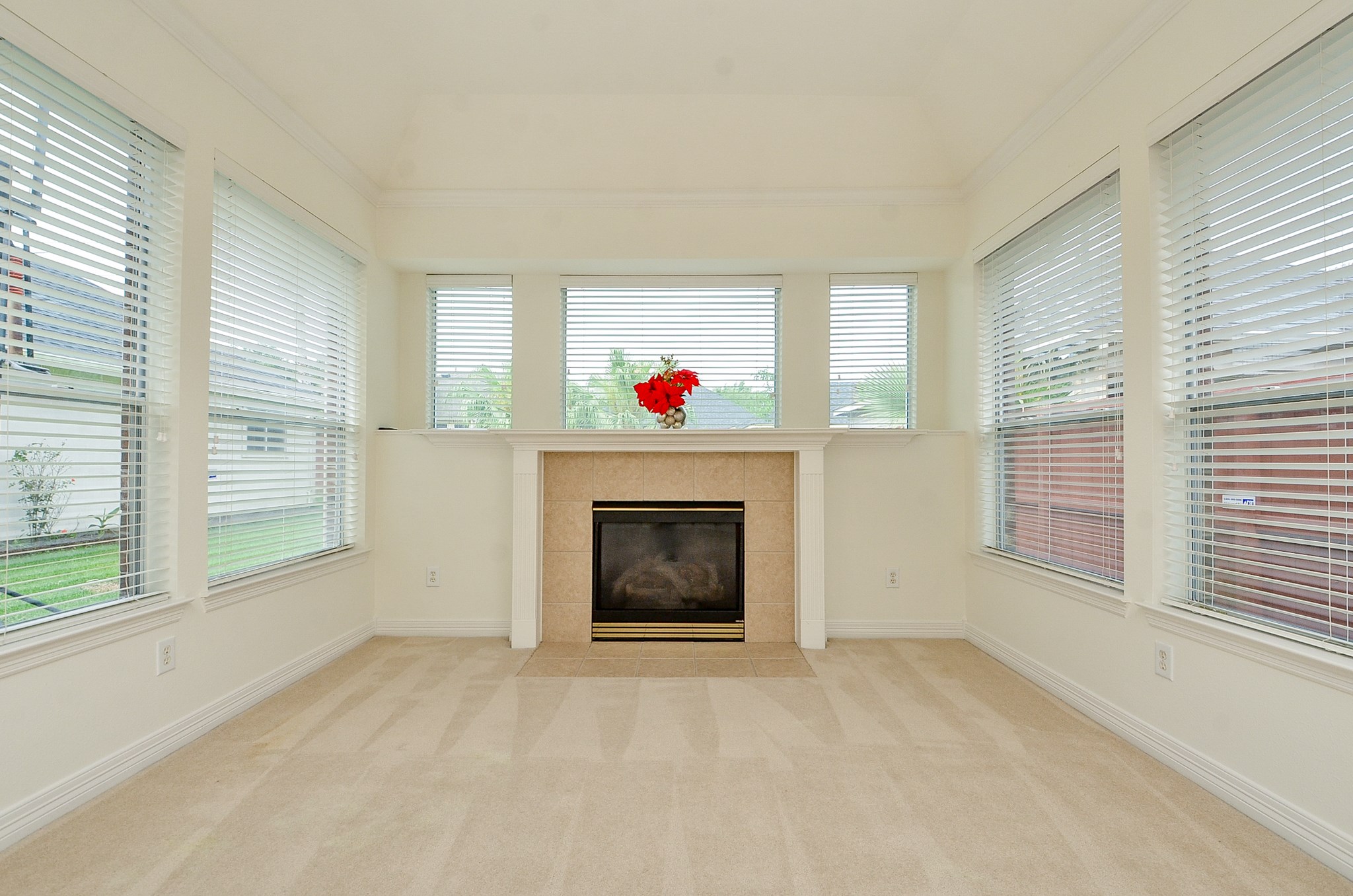 12522 Aliso Bend Lane Houston, TX 77041 - Photo 15 of 32 a living room with furniture and a fireplace
