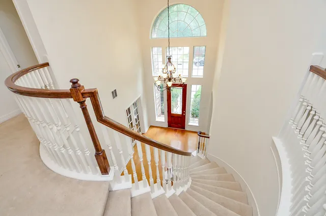 a view of an empty room with a closet