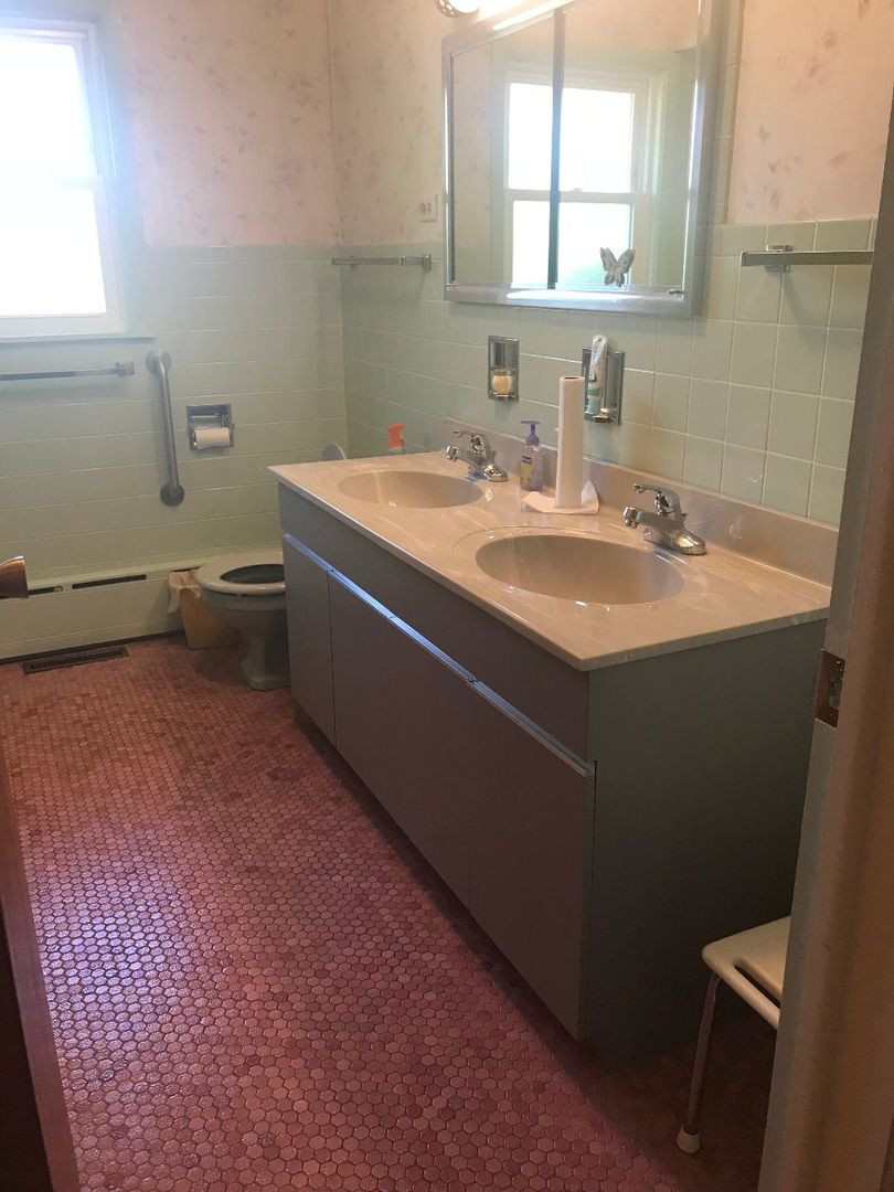 2110 Beechnut Road Northbrook, IL 60062 - Photo 6 of 10 a bathroom with a sink toilet and mirror