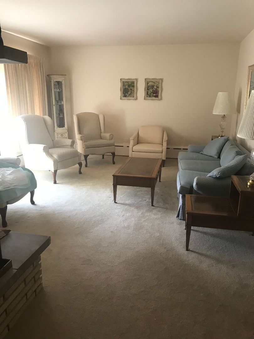 2110 Beechnut Road Northbrook, IL 60062 - Photo 10 of 10 a living room with furniture and a lamp