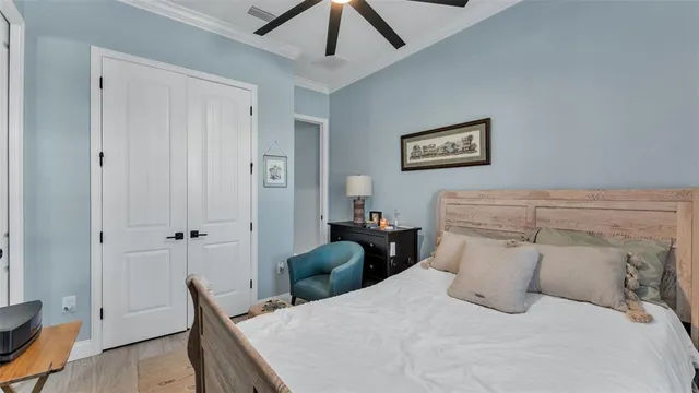 a bedroom with a bed and a table