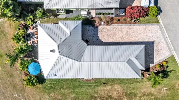 a view of outdoor sitting area with furniture and garden
