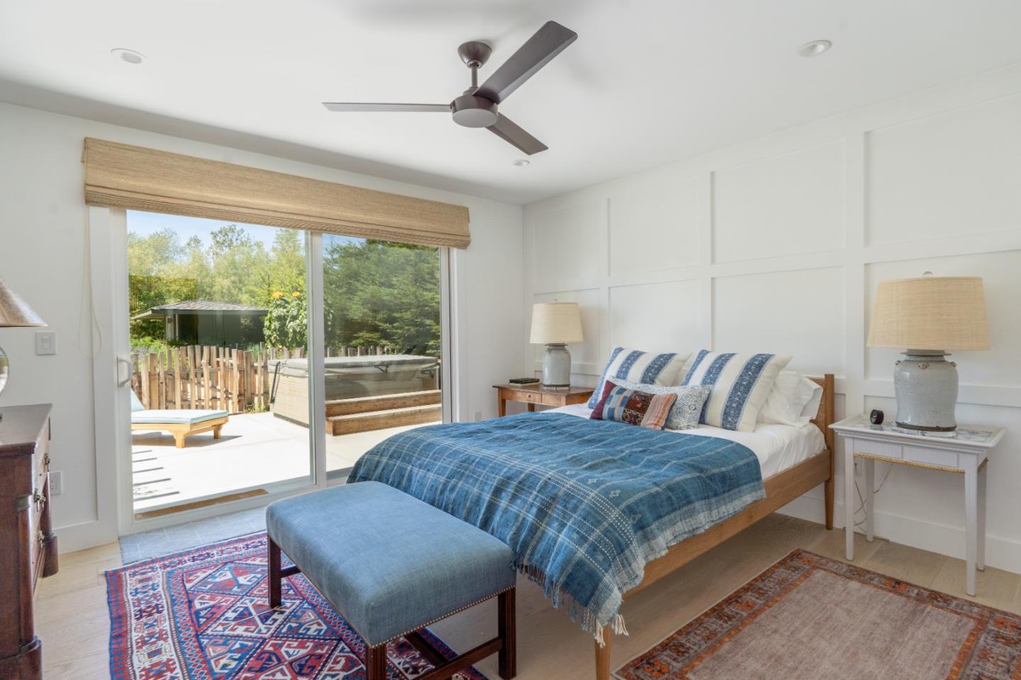 28060 Robinson Canyon Road Carmel, CA 93923 - Photo 11 of 36 a bedroom with a bed a couch and a window