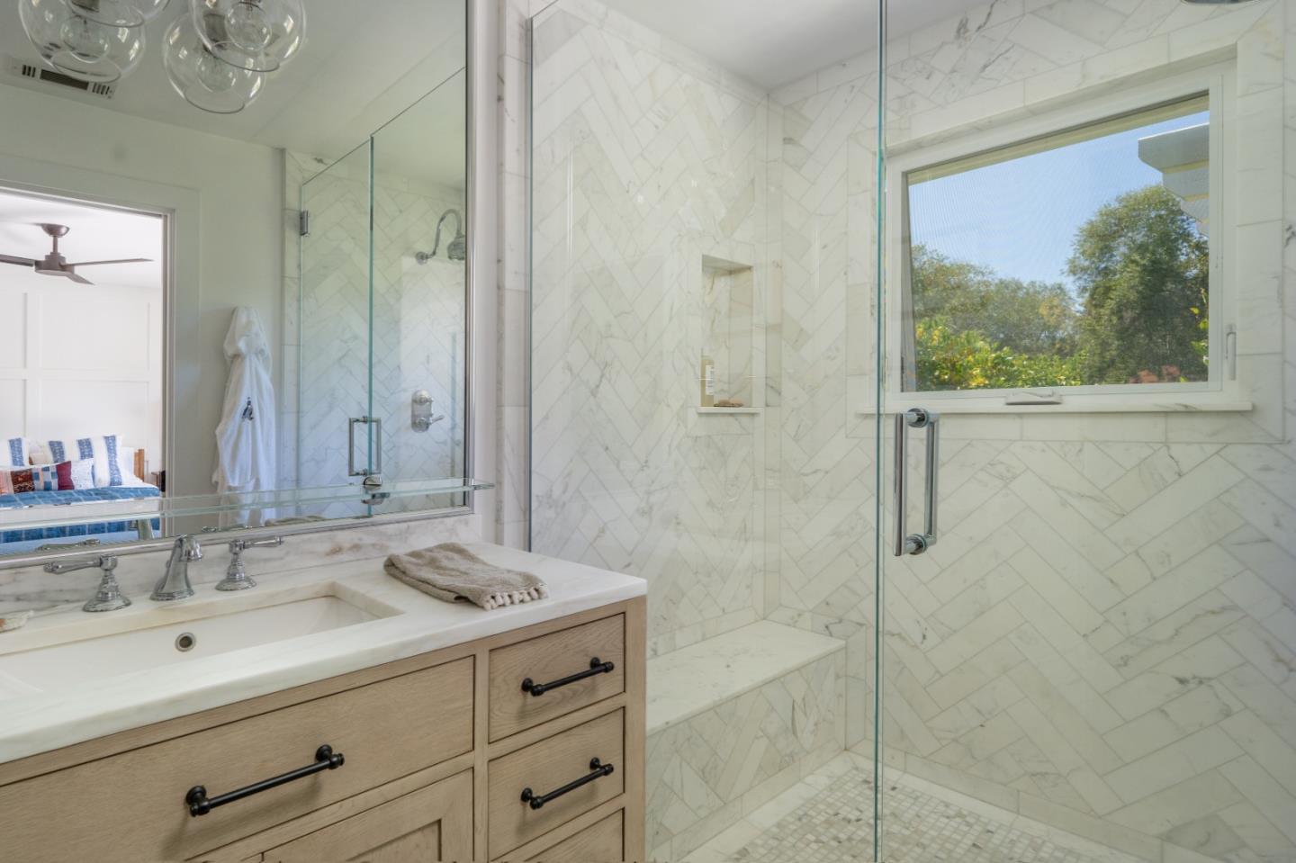 28060 Robinson Canyon Road Carmel, CA 93923 - Photo 13 of 36 a bathroom with a sink and a mirror