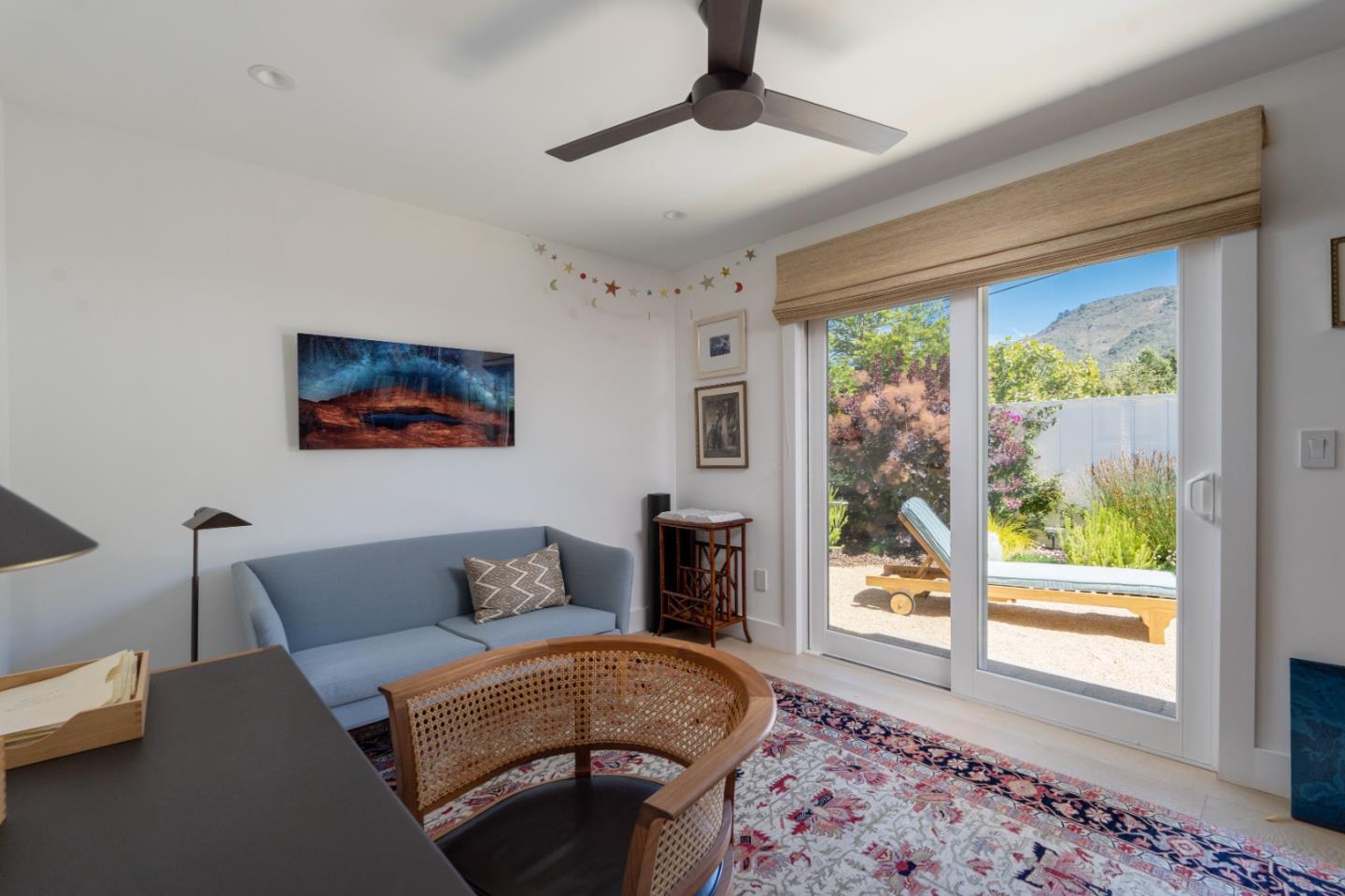 28060 Robinson Canyon Road Carmel, CA 93923 - Photo 15 of 36 a living room with furniture and a window