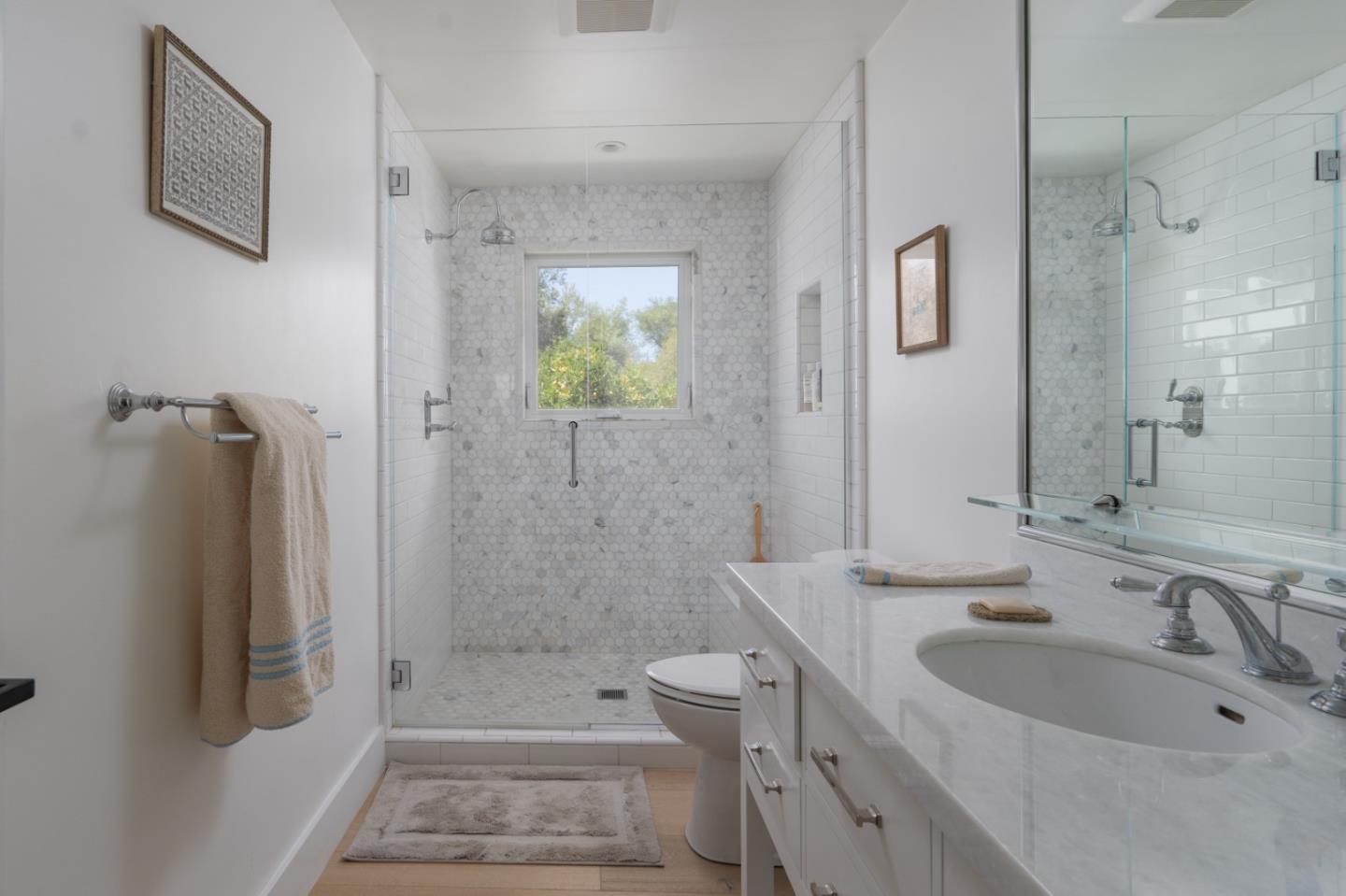 28060 Robinson Canyon Road Carmel, CA 93923 - Photo 20 of 36 a bathroom with a sink a toilet and shower