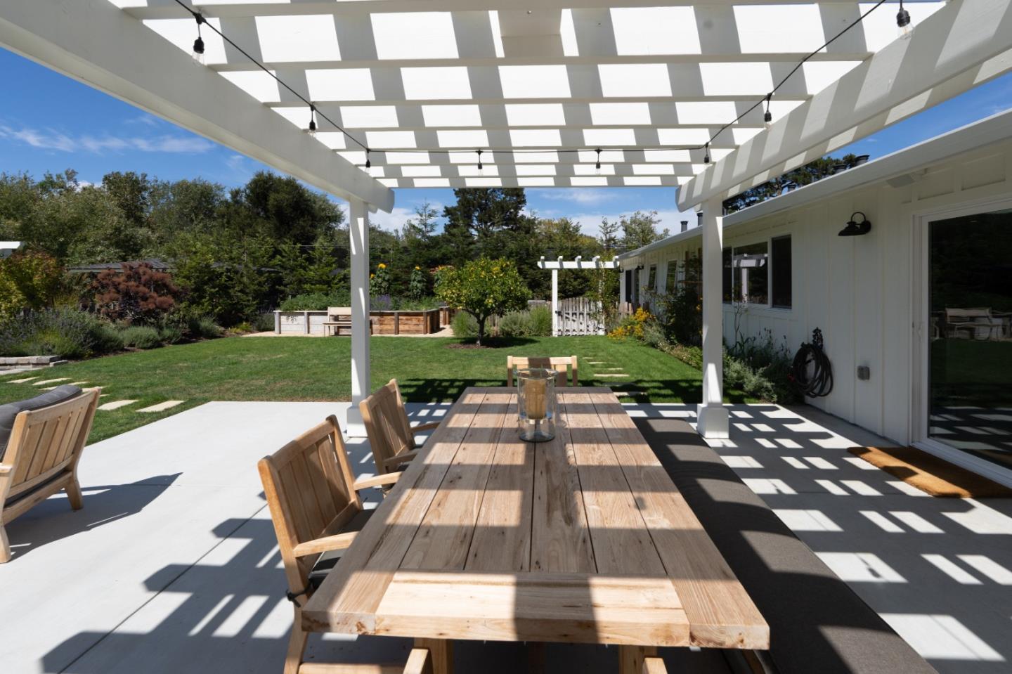28060 Robinson Canyon Road Carmel, CA 93923 - Photo 25 of 36 a view of a patio with chairs next to a yard