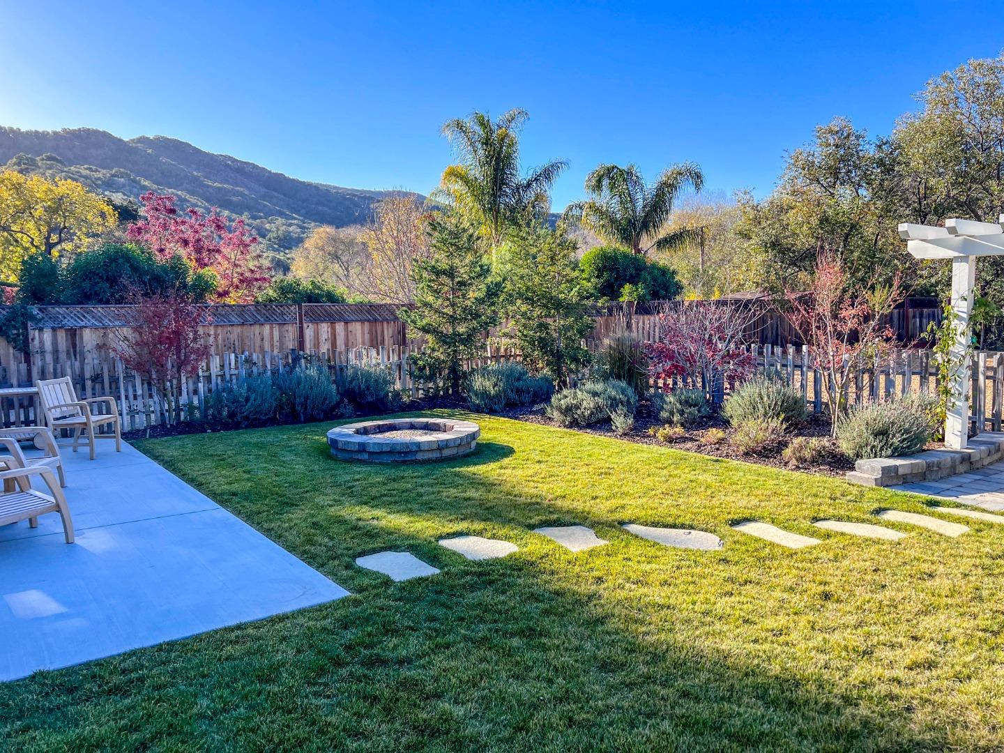 28060 Robinson Canyon Road Carmel, CA 93923 - Photo 28 of 36 a swimming pool with outdoor seating and yard