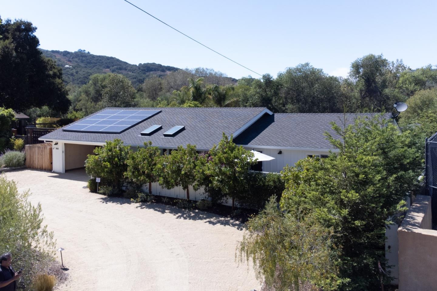 28060 Robinson Canyon Road Carmel, CA 93923 - Photo 29 of 36 a view of a house with a garden