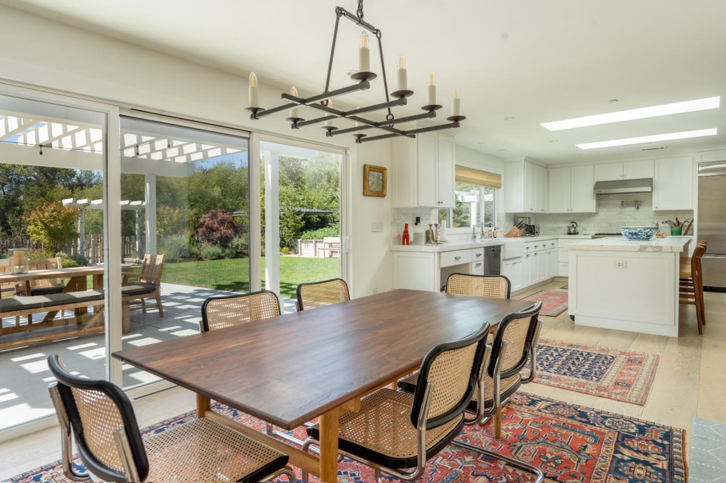 28060 Robinson Canyon Road Carmel, CA 93923 - Photo 3 of 36 a view of a dining room with furniture window and outside view