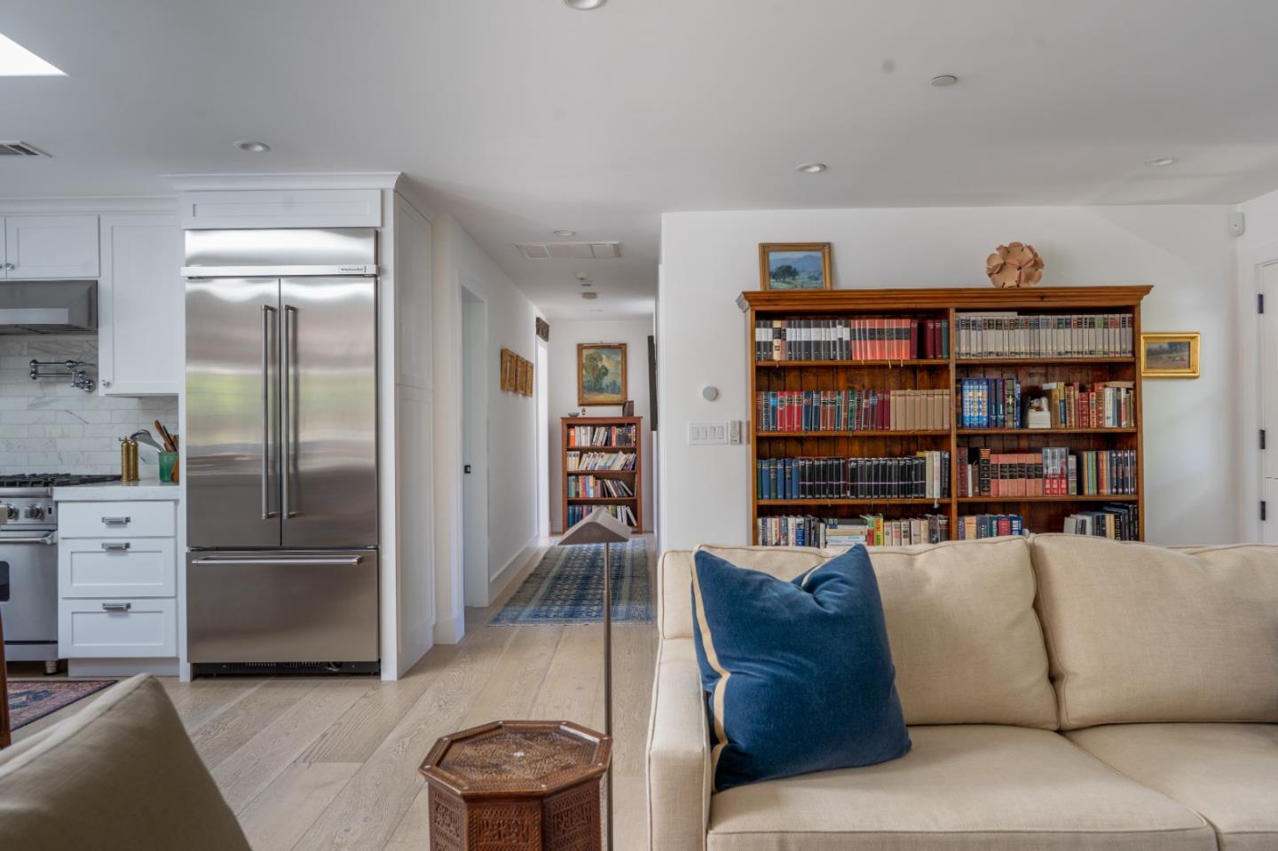 28060 Robinson Canyon Road Carmel, CA 93923 - Photo 6 of 36 a living room with furniture and a book shelf