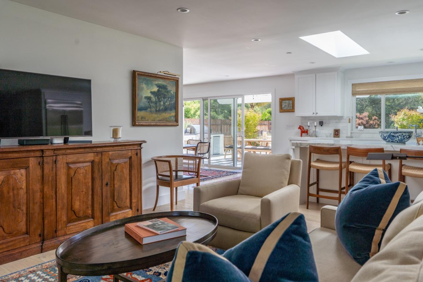 28060 Robinson Canyon Road Carmel, CA 93923 - Photo 7 of 36 a living room with furniture and a flat screen tv
