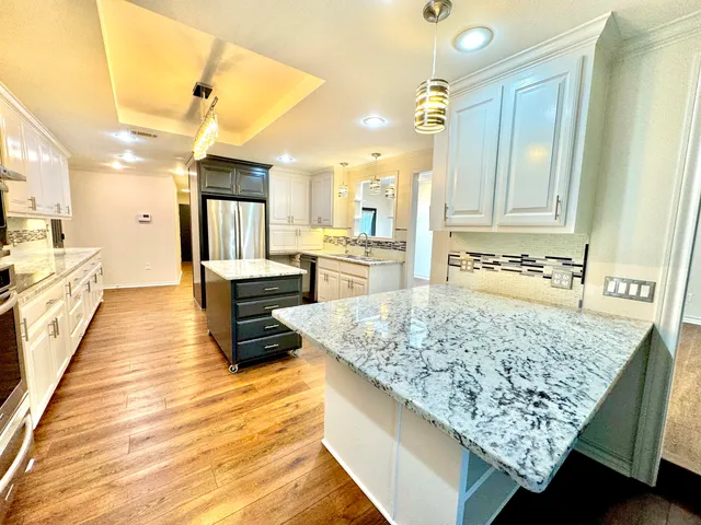 a view of kitchen and living room