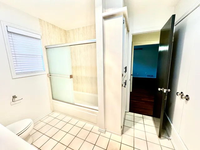 a bathroom with a sink and a shower