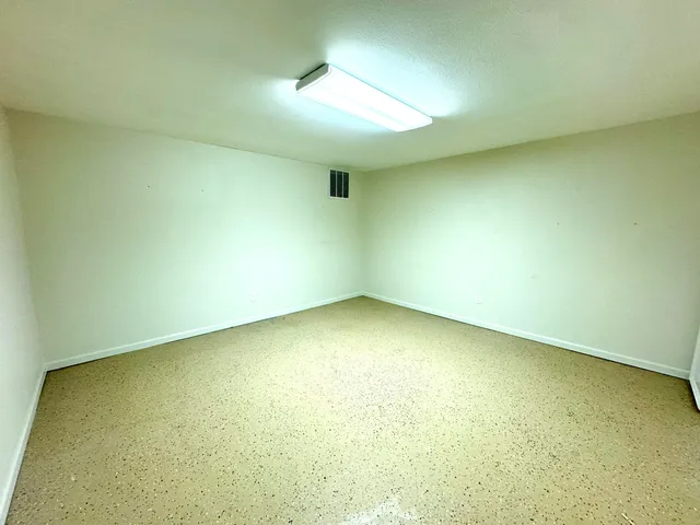 an empty room with a natural light