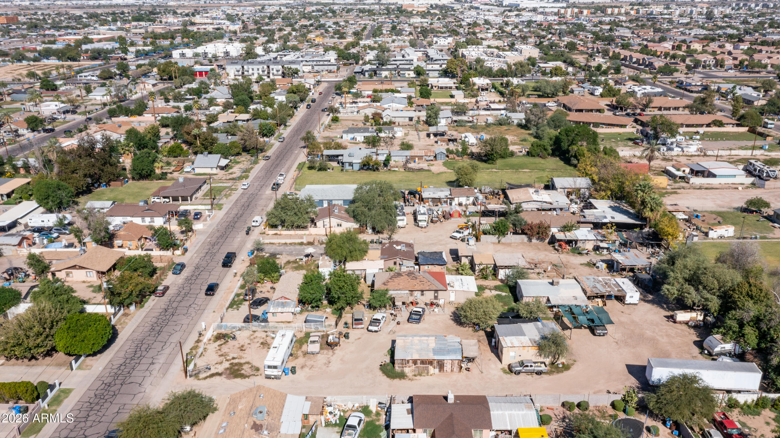 5437 South 4th Street Phoenix, AZ 85040 - Photo 13 of 28 an aerial view of residential houses with outdoor space