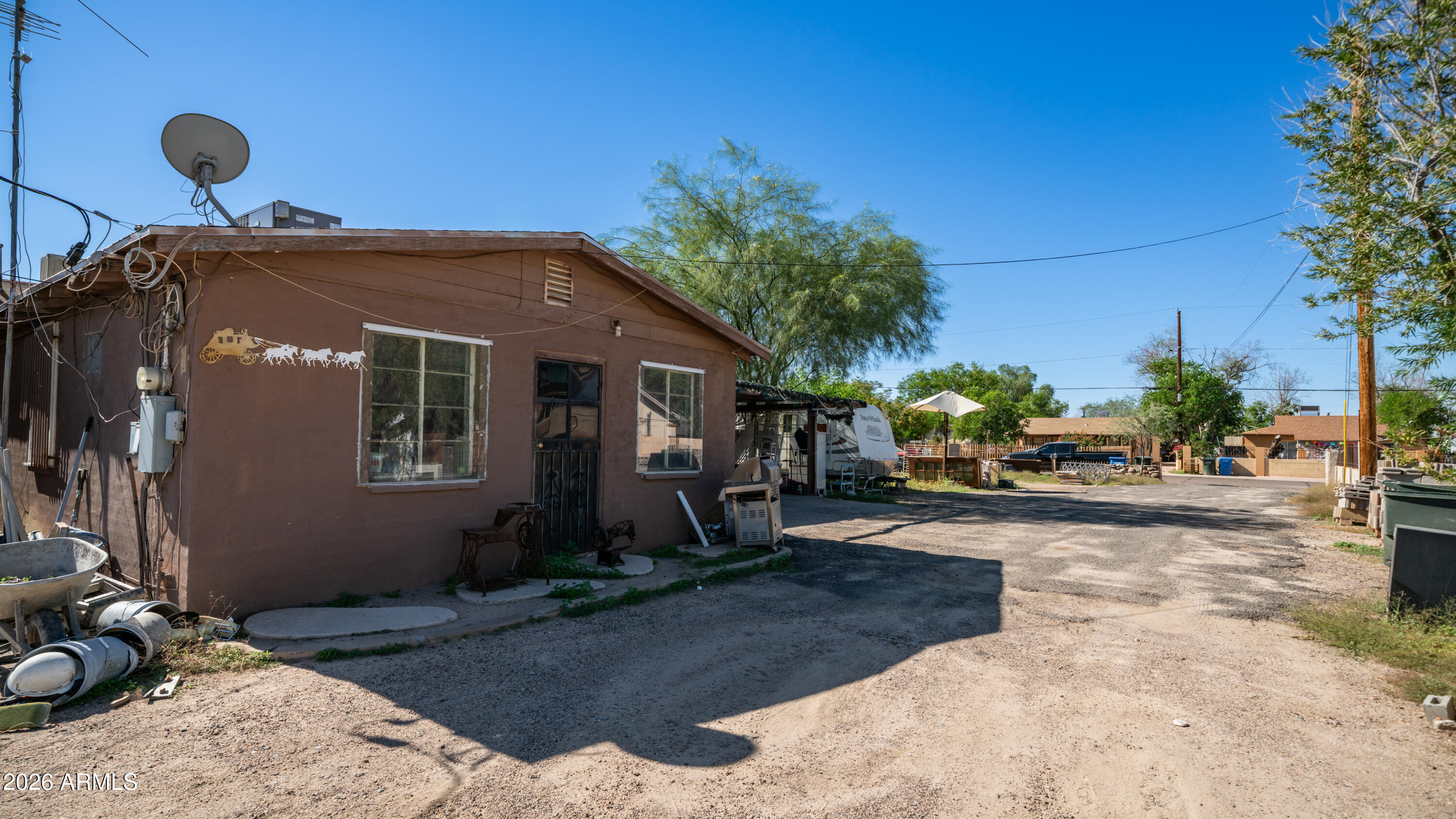 5437 South 4th Street Phoenix, AZ 85040 - Photo 17 of 28 a front view of a house with patio
