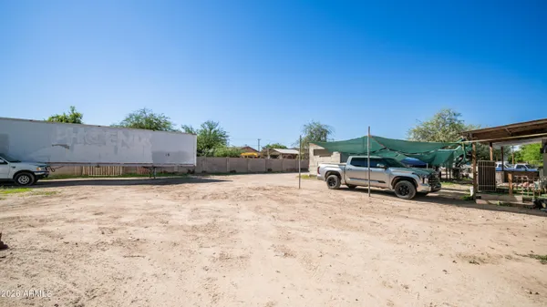 a view of a cars parked in front of a house