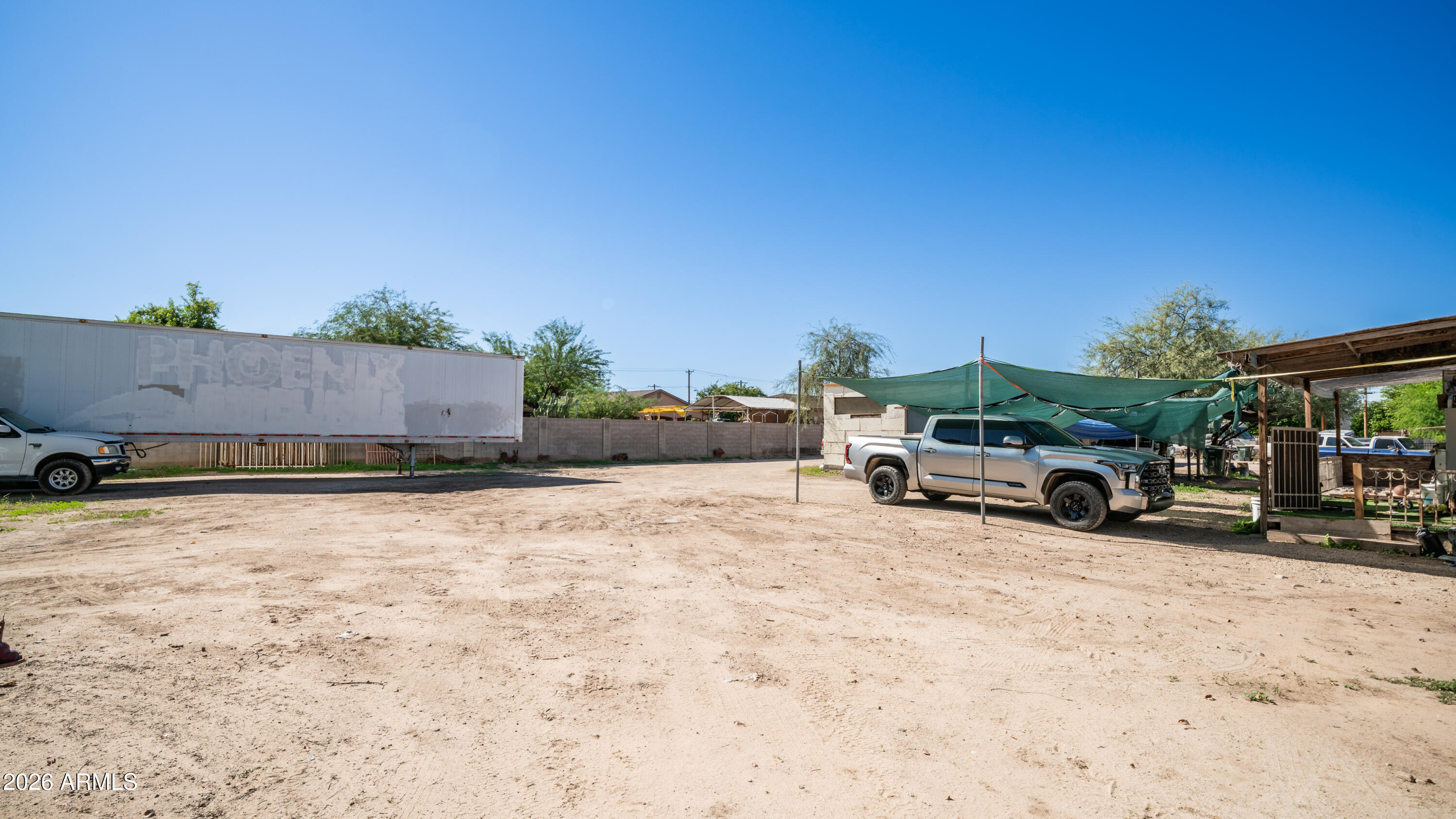 5437 South 4th Street Phoenix, AZ 85040 - Photo 21 of 28 a view of a cars park in front of a building