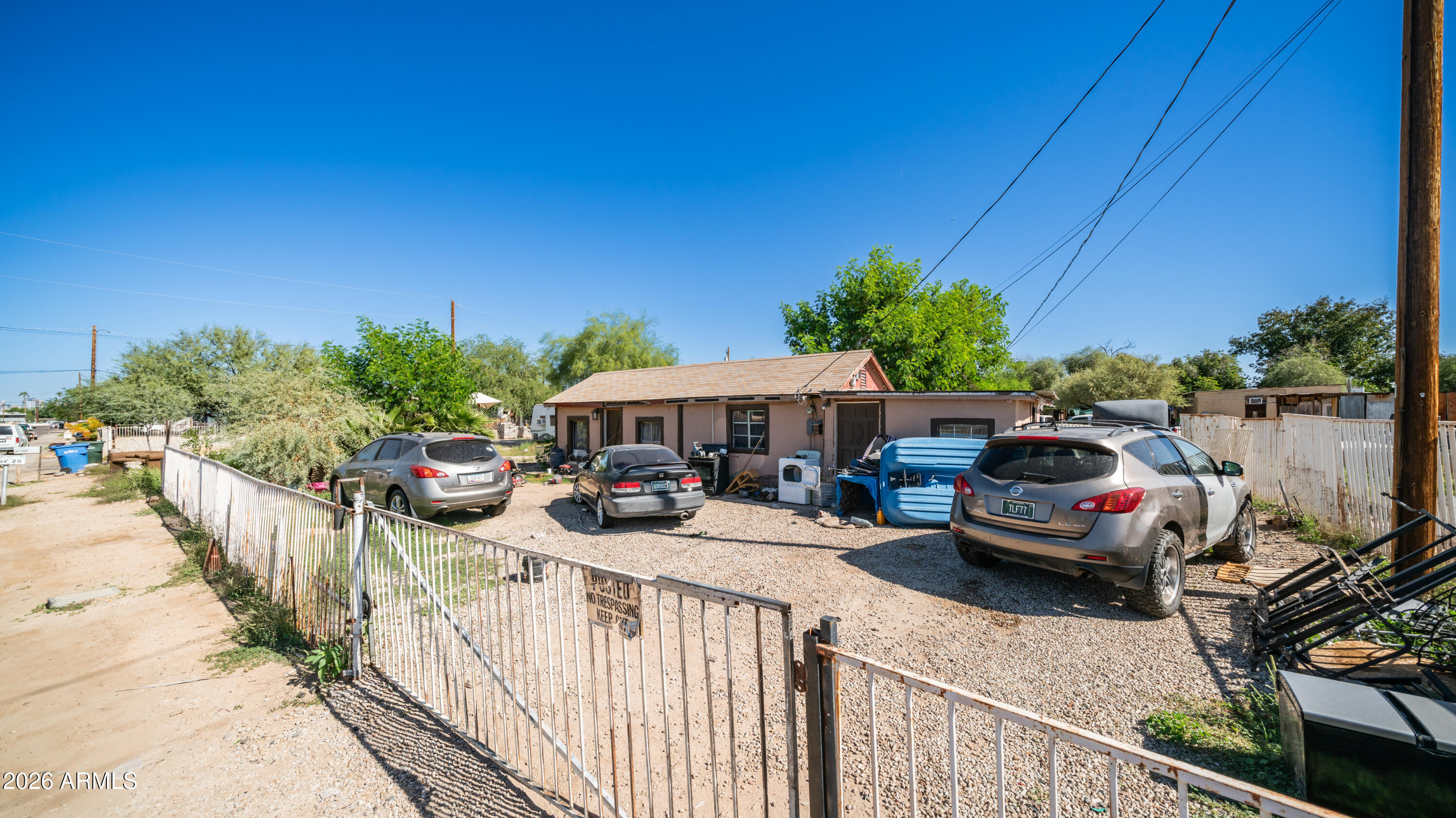 5437 South 4th Street Phoenix, AZ 85040 - Photo 27 of 28 a view of a street with cars parked