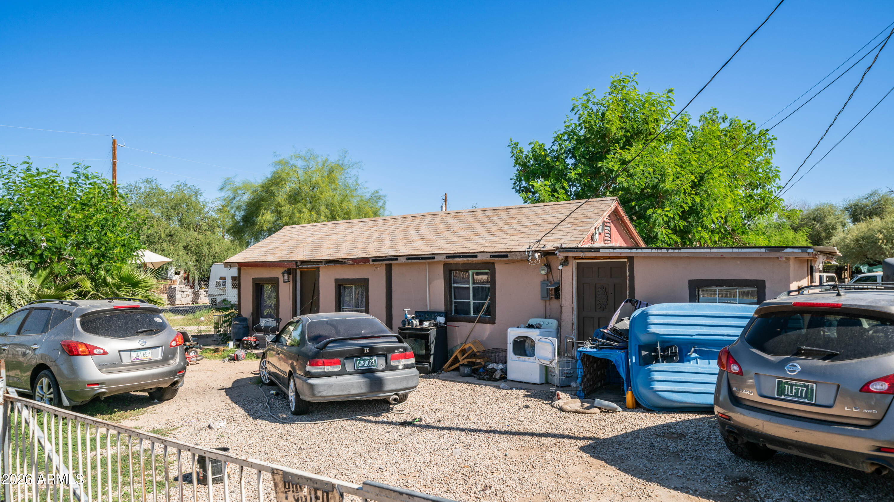 5437 South 4th Street Phoenix, AZ 85040 - Photo 28 of 28 a car parked in front of a house