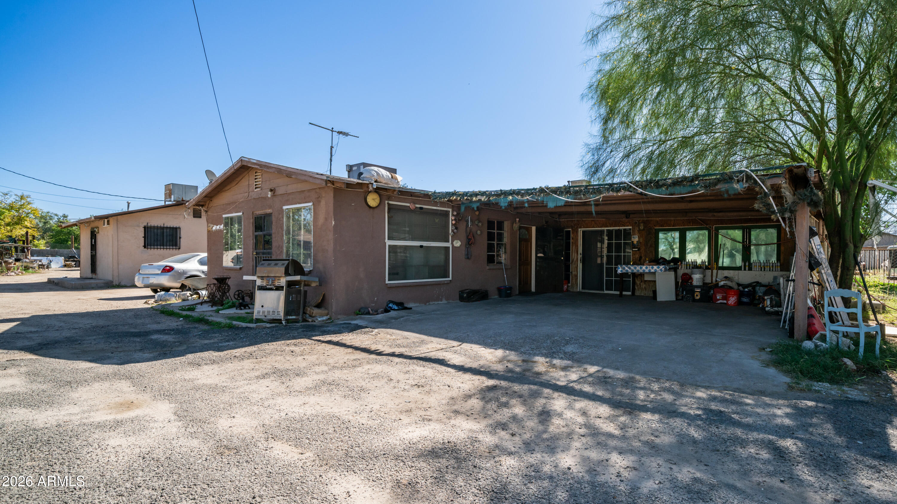 5437 South 4th Street Phoenix, AZ 85040 - Photo 5 of 28 a view of a house with backyard