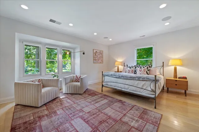 a living room with furniture and decor