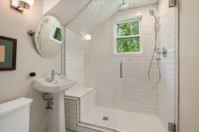 a view of balcony with wooden floor and outdoor seating