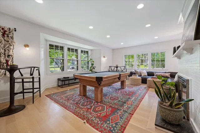 a living room with furniture a window and a table