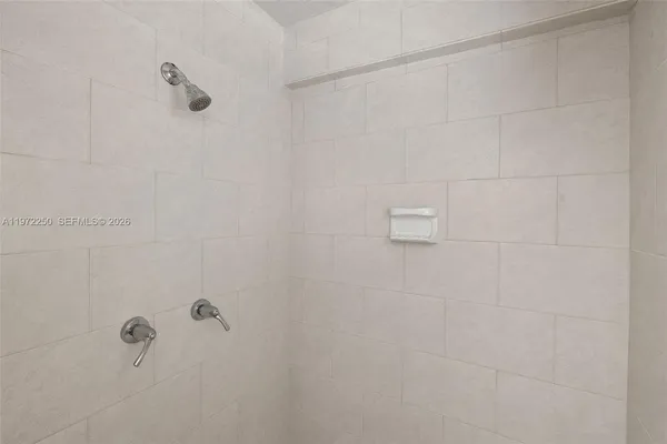 a view of cabinets a sink and dishwasher in a kitchen