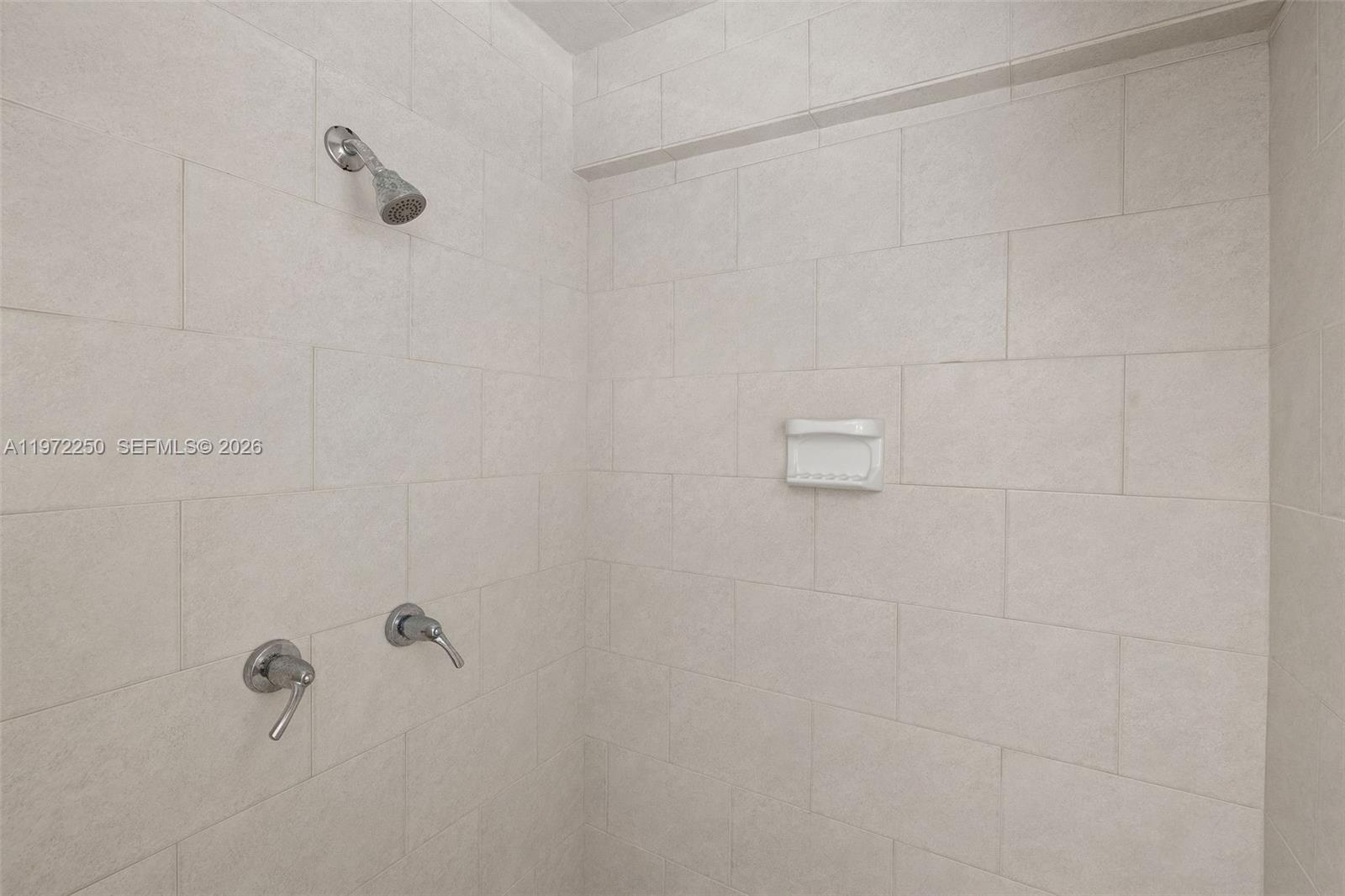 4925 Collins Avenue, Unit CU2 Miami Beach, FL 33140 - Photo 7 of 11 Full Shower