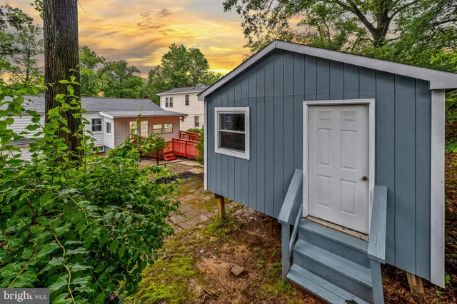 a backyard of a house with seating space