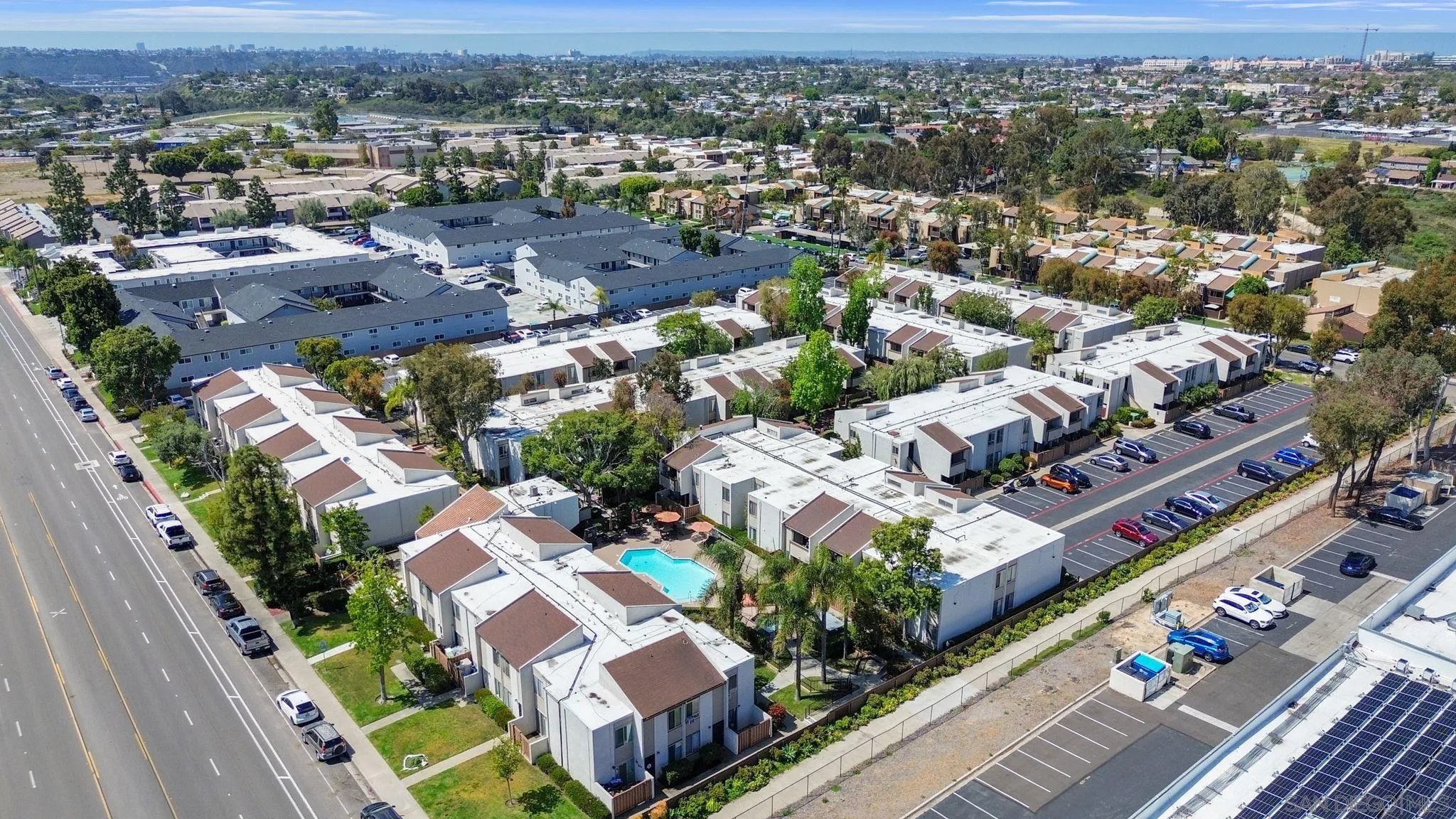 3550 Ruffin Road, Unit 235 San Diego, CA 92123 - Photo 24 of 26 an aerial view of residential houses with outdoor space and parking