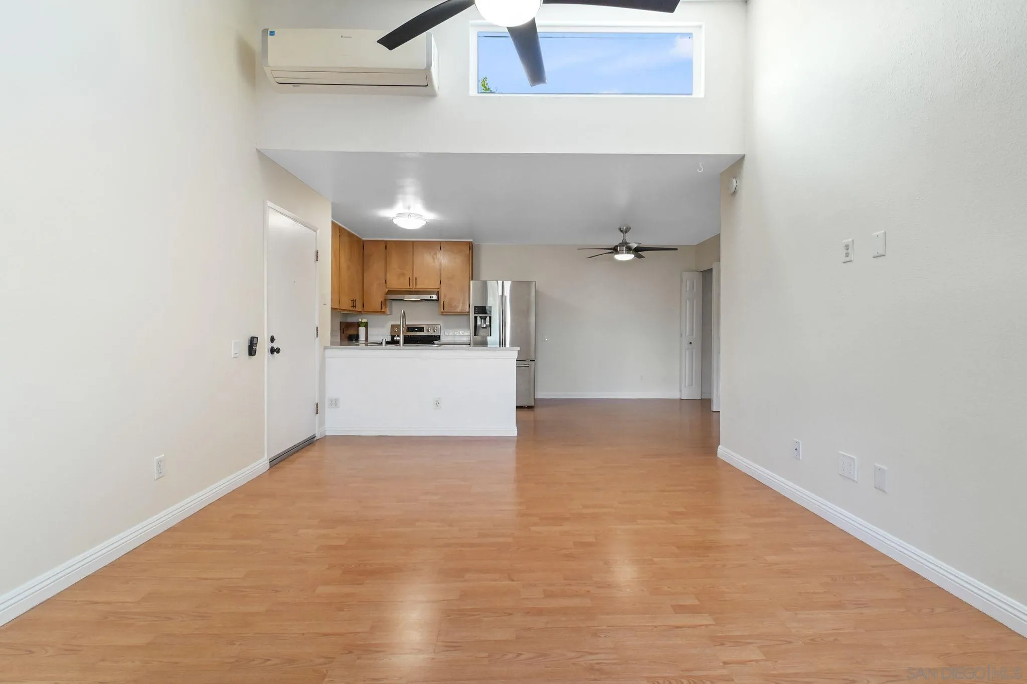 3550 Ruffin Road, Unit 235 San Diego, CA 92123 - Photo 5 of 26 a view of a kitchen and a window
