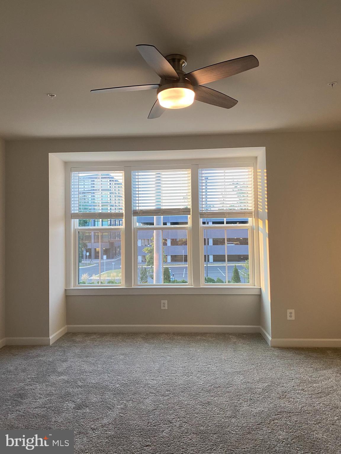 12884 Sunrise Ridge Alley, Unit 47 Herndon, VA 20171 - Photo 17 of 37 a view of an empty room with a window