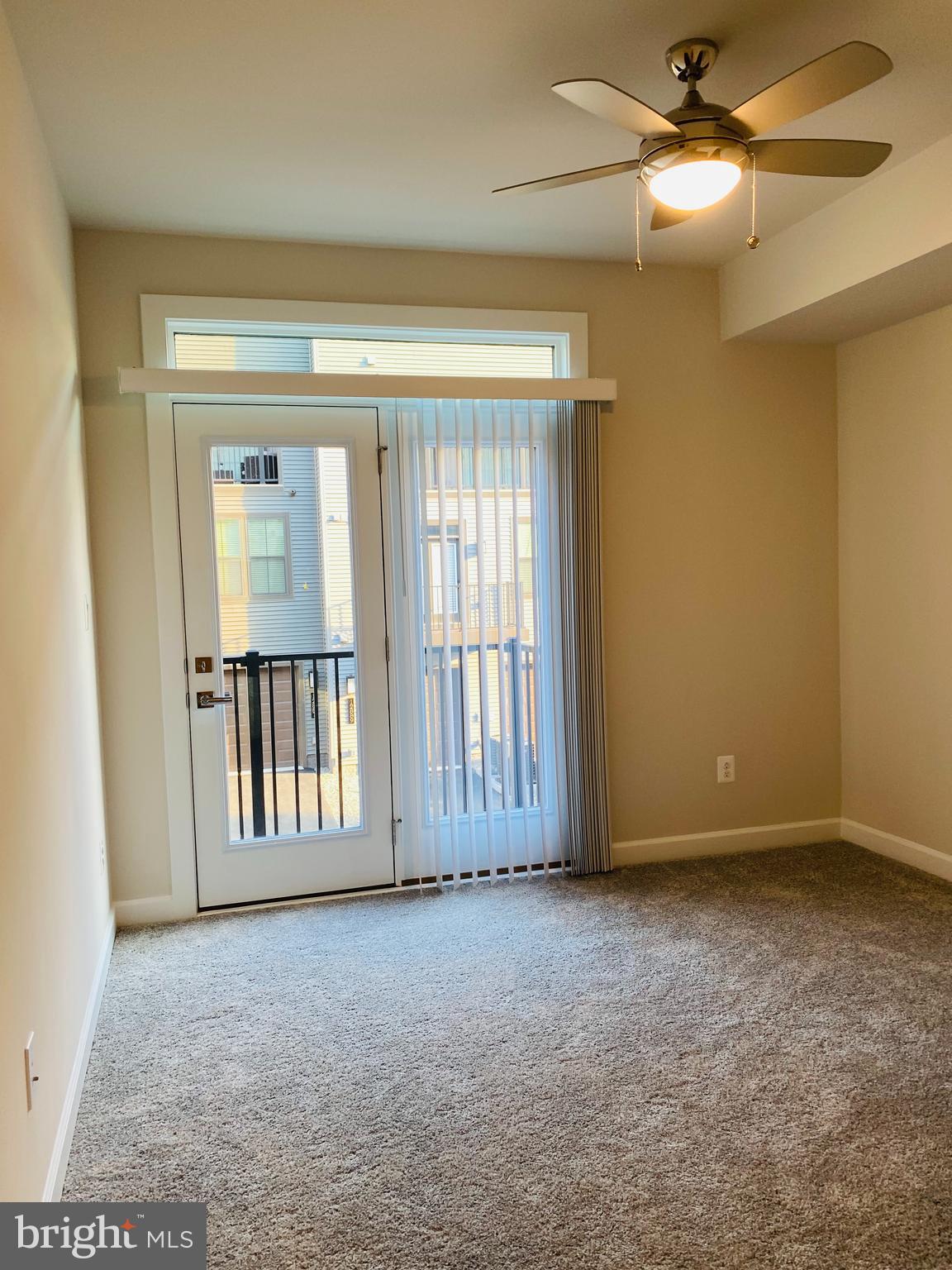 12884 Sunrise Ridge Alley, Unit 47 Herndon, VA 20171 - Photo 24 of 37 a view of an empty room with a window
