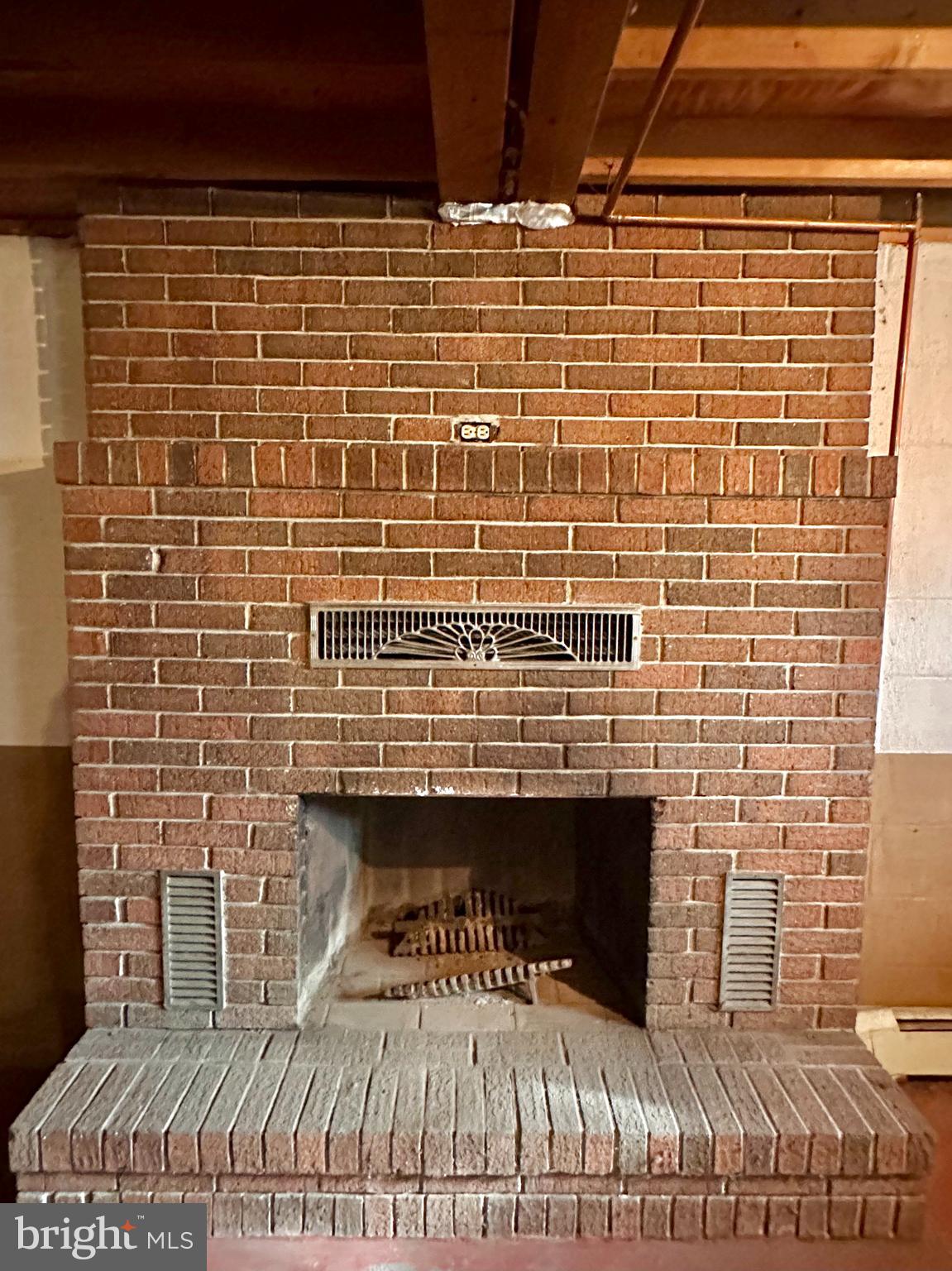 242 Gracey Road Waterfall, PA 16689 - Photo 16 of 40 a bathroom with a sink a toilet and a mirror