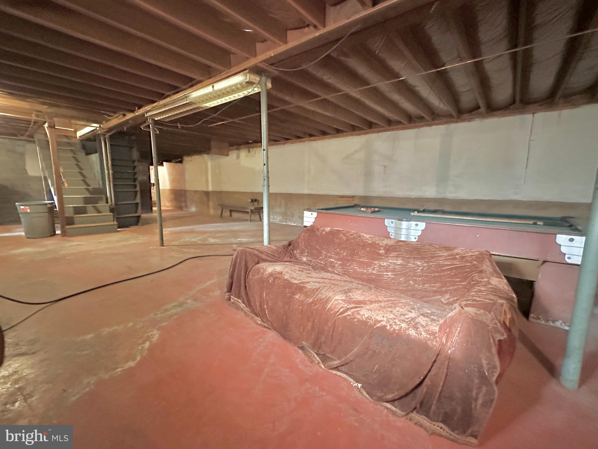 242 Gracey Road Waterfall, PA 16689 - Photo 18 of 40 a bed sitting in a room next to a window