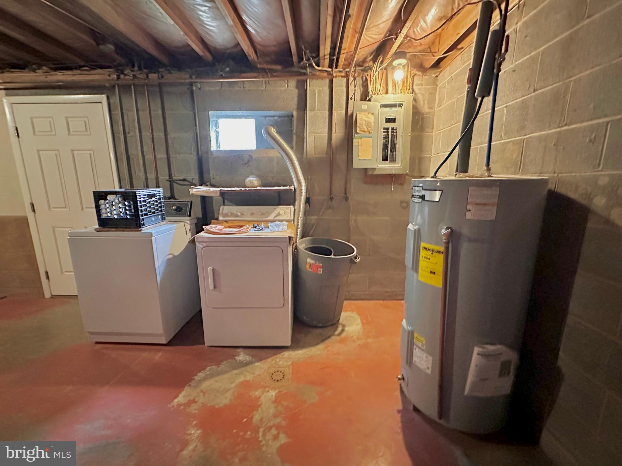 242 Gracey Road Waterfall, PA 16689 - Photo 23 of 40 a room with refrigerator and washer