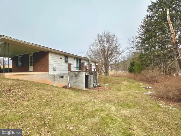 a view of an ocean and mountain