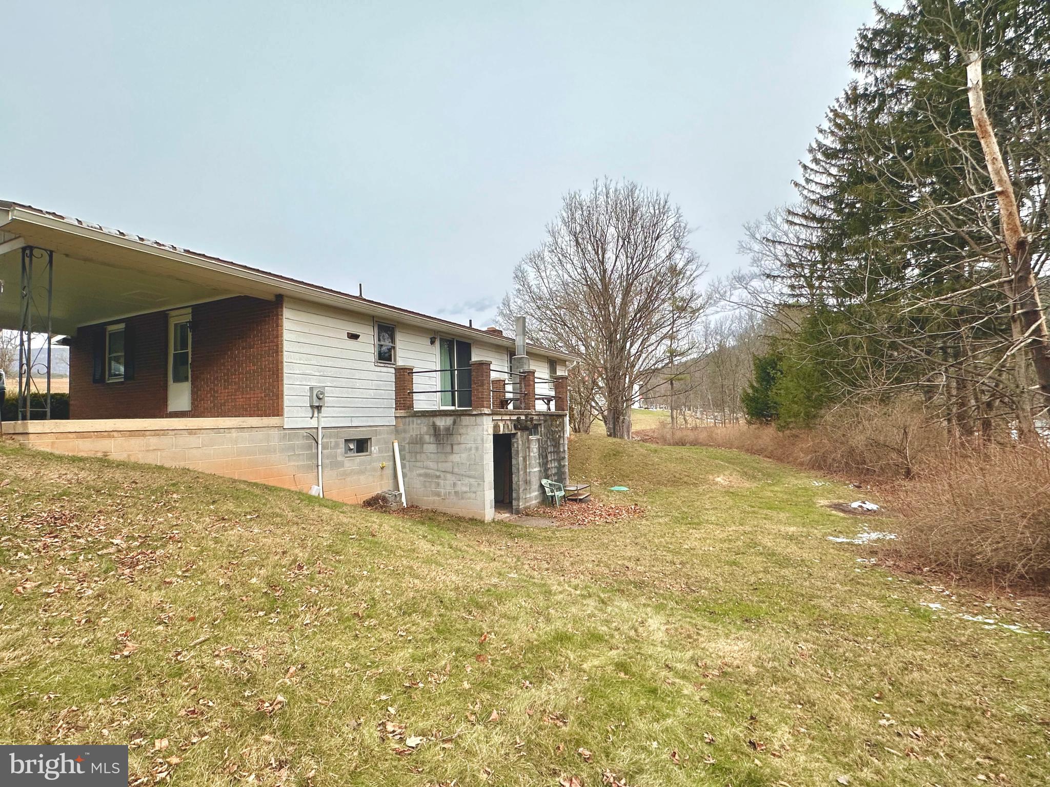 242 Gracey Road Waterfall, PA 16689 - Photo 27 of 40 a view of a house with a yard