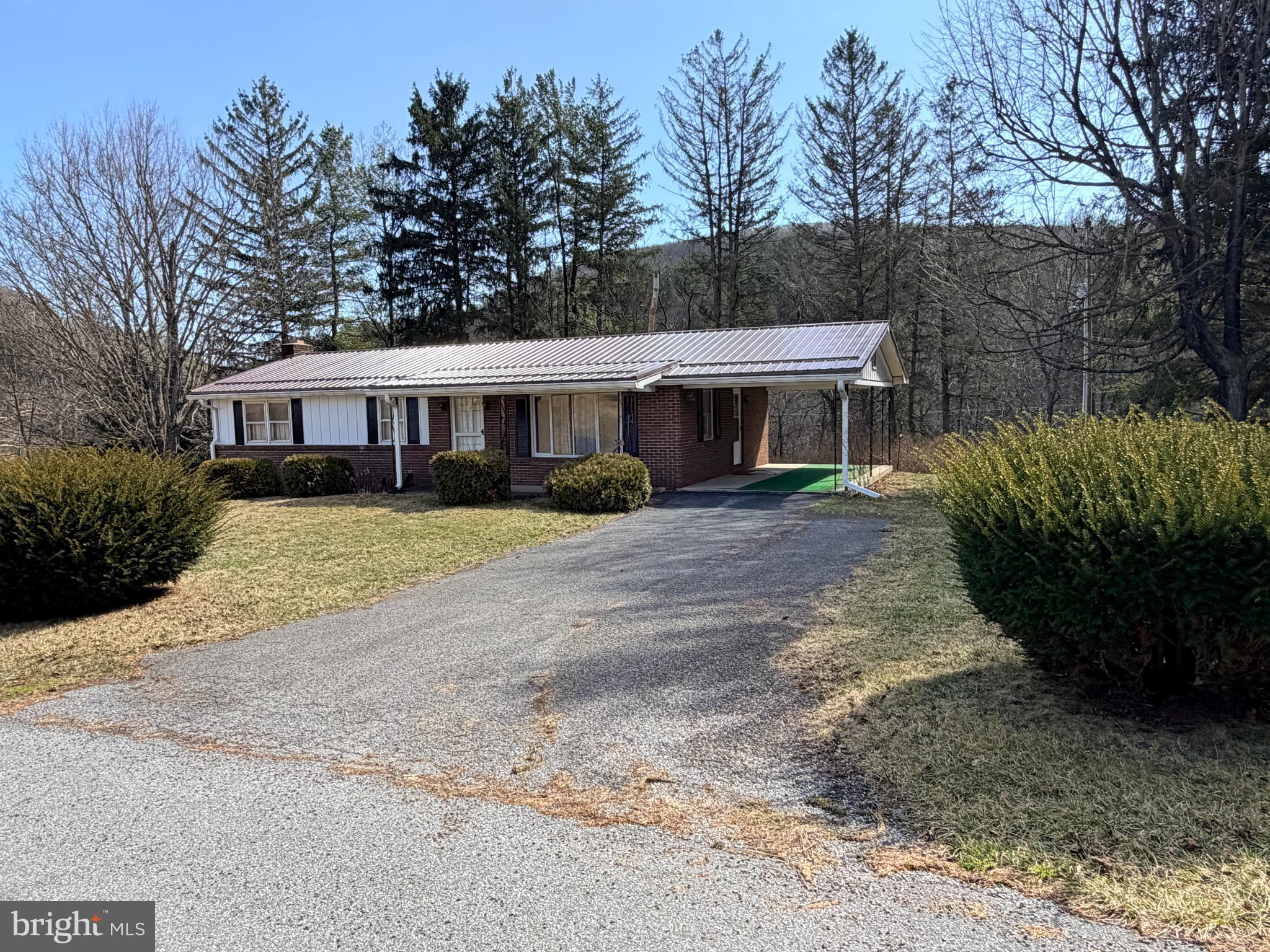 242 Gracey Road Waterfall, PA 16689 - Photo 36 of 40 a view of a house with a yard