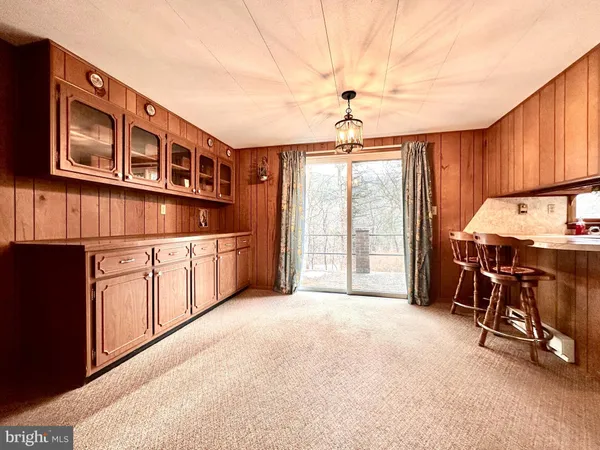 a view of a hallway with a large window