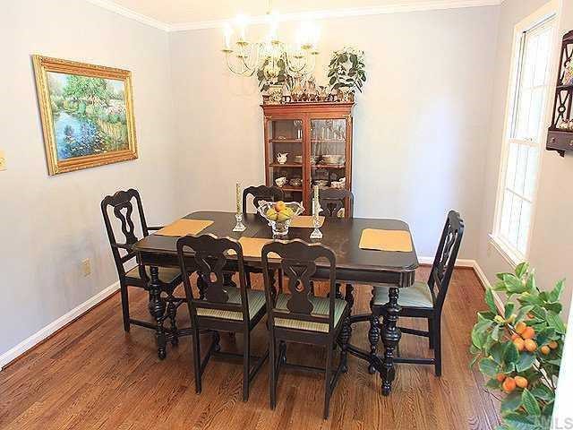 7320 Glendower Road Raleigh, NC 27613 - Photo 5 of 12 Large formal dining with hardwoods.