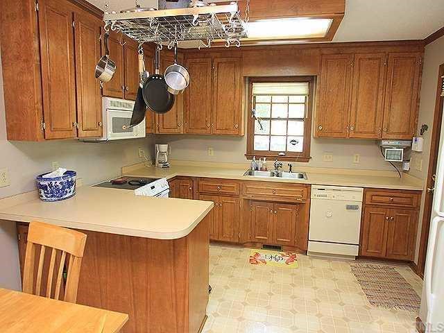 7320 Glendower Road Raleigh, NC 27613 - Photo 6 of 12 Spacious kitchen with lots of counter space.