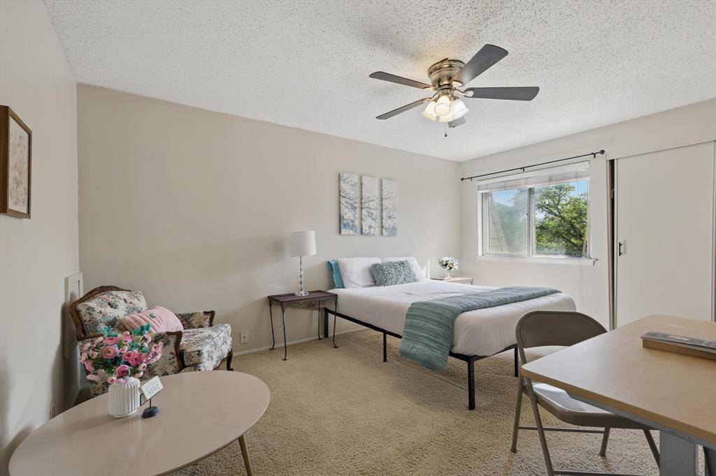 2700 Stonehaven Court Irving, TX 75038 - Photo 27 of 40 a bed room with furniture and a window