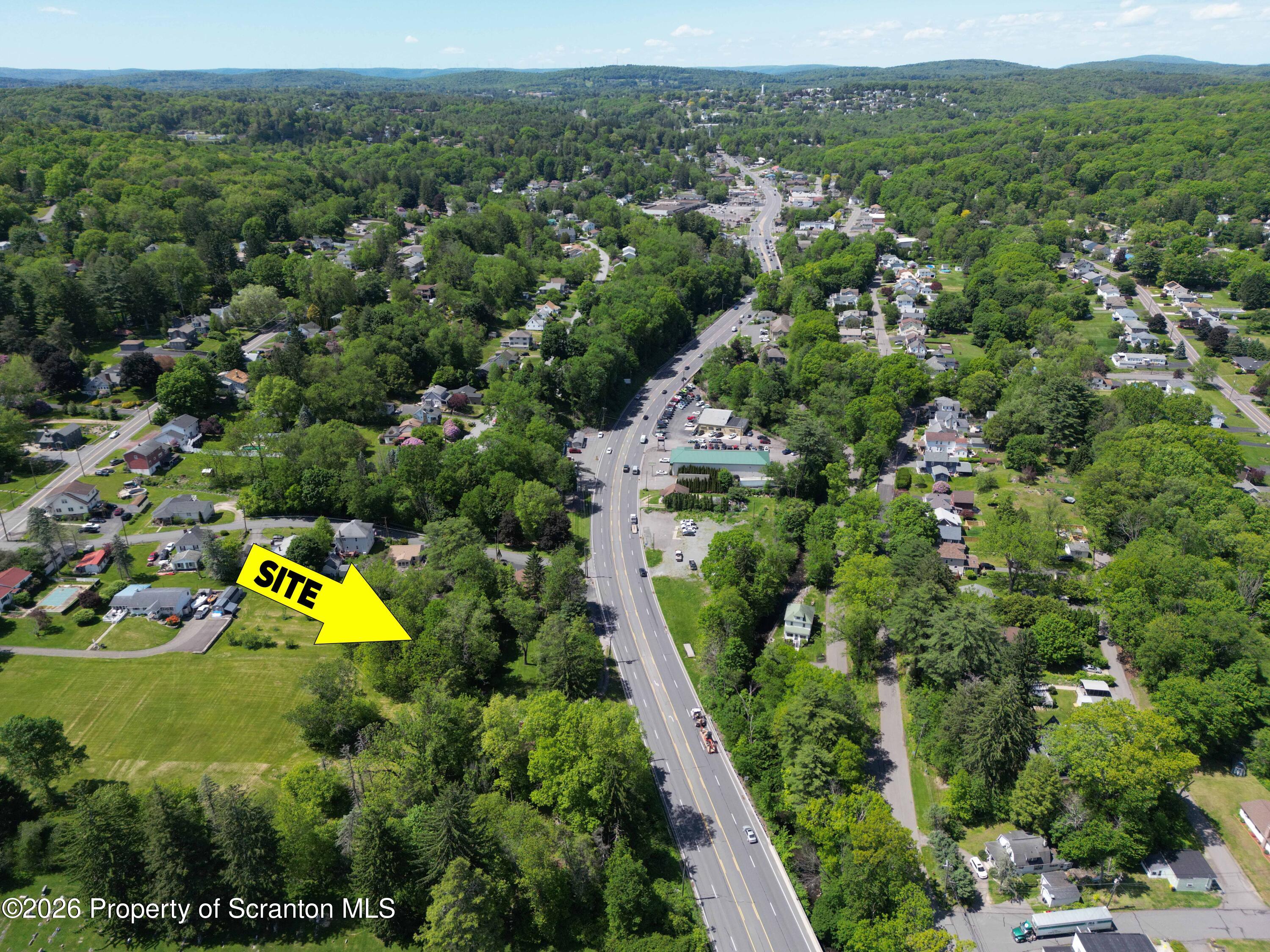 1674 North Memorial Highway Shavertown, PA 18708 - Photo 5 of 8 an aerial view of house with yard swimming pool and outdoor seating