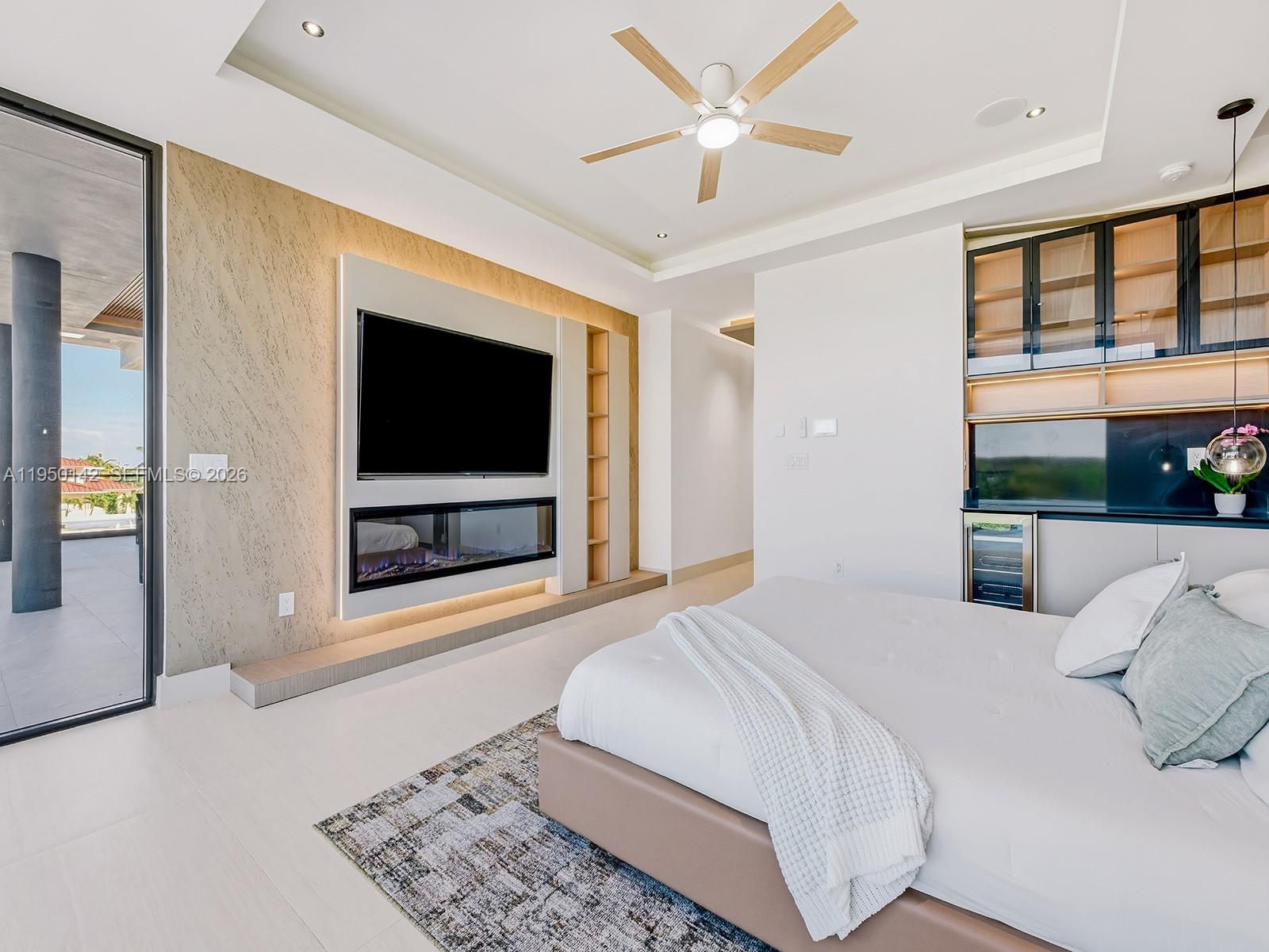 16 South Exuma Road Key Largo, FL 33037 - Photo 13 of 21 a bedroom with a large bed and a flat screen tv
