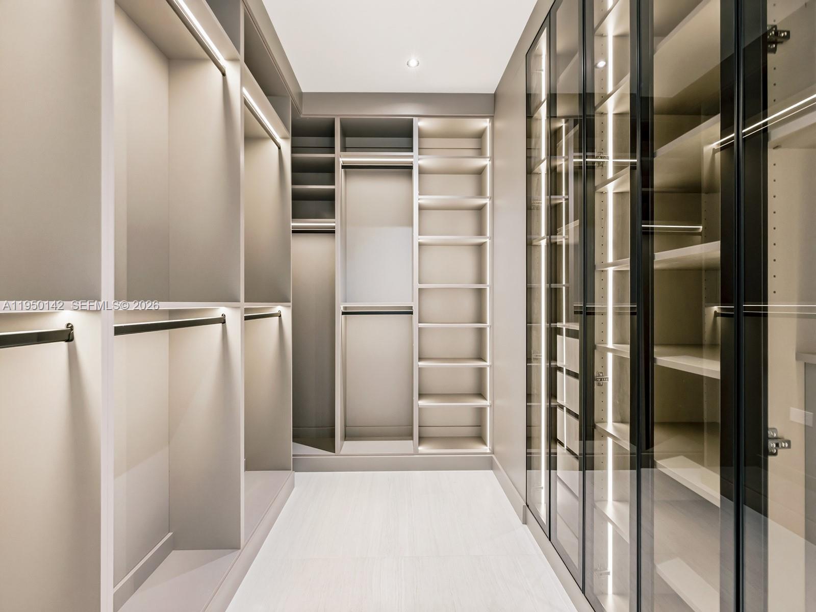 16 South Exuma Road Key Largo, FL 33037 - Photo 14 of 21 a view of walk in closet with empty racks